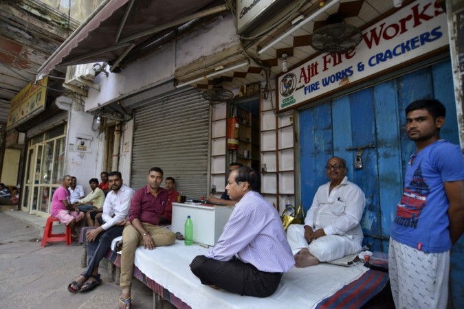 In picture: Firecracker traders sit idle outside their shops near a Jama Masjid market in Delhi on October 9, 2017. Supreme Court bans crackers