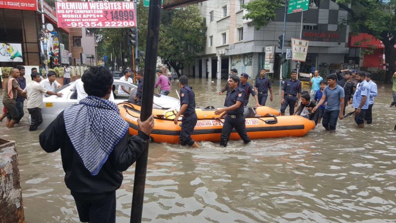 In the picture, people in Kormangala use this rowboat to navigate through waterlogged streets Kormangala boat