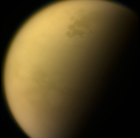 This view of Saturn's largest moon, Titan, is among the last images the Cassini spacecraft sent to Earth before it plunged into the giant planet's atmosphere. nasa, Cassini, Titan, clouds, space,