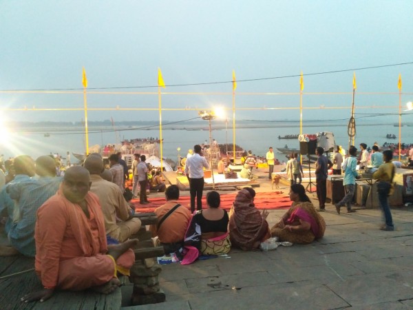 In picture: People prepare for the evening Ganga Aarti in front of the river in Varanasi. Varanasi