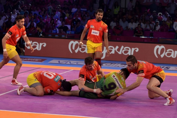Players in action during a Pro Kabaddi League match. pro kabaddi