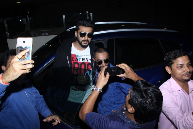 Arjun Kapoor greets his fans after returning back from Dubai at the Mumbai airport on October 24. Arjun Kapoor