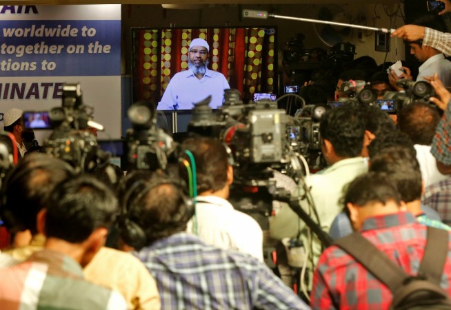 Zakir Naik, an Indian Islamic preacher and founder of Islamic Research Foundation, speaks to the media via a video conference in Mumbai, India, July 15, 2016. Zakir Naik