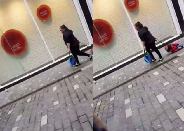 Video grabs show woman dragging child along pavement in Liverpool Woman pulling child