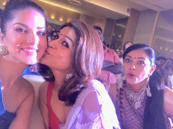 Shraddha Das kissing Sunny Leone at PSV Garuda Vega event Shraddha Das kissing Sunny Leone at PSV Garuda Vega event