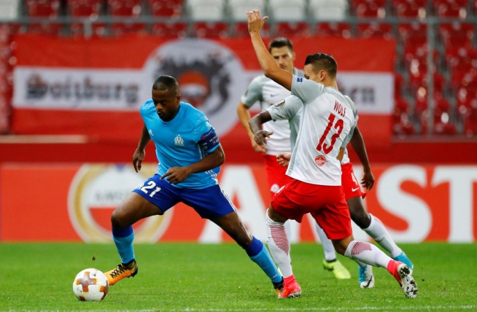 Patrice Evra (left). Patrice Evra