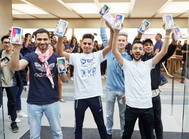 Customers with the new iPhone X in Sydney Customers with the new iPhone X in Sydney