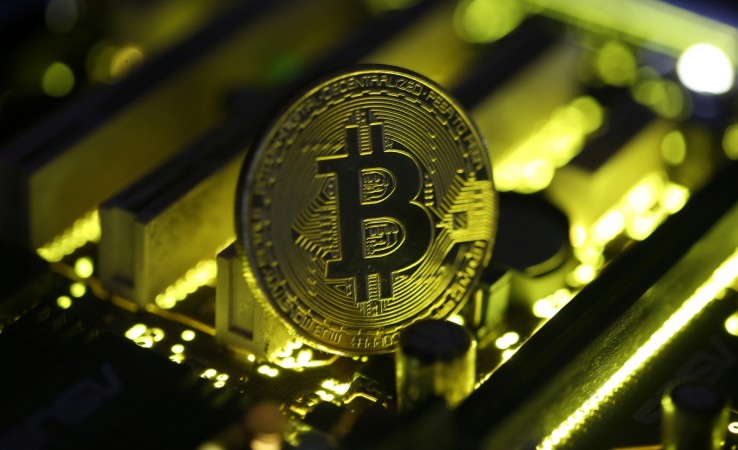 A copy of bitcoin standing on PC motherboard is seen in this illustration picture, October 26, 2017. Picture taken October 26, 2017. Bitcoin
