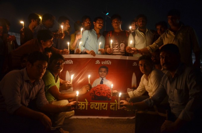 In picture: People participate in a candle light vigil on September 11, 2017, over death of 7-year-old Pradyuman who was found dead by a school staff in Ryan international School's washroom with his throat slit. Pradyuman murder case
