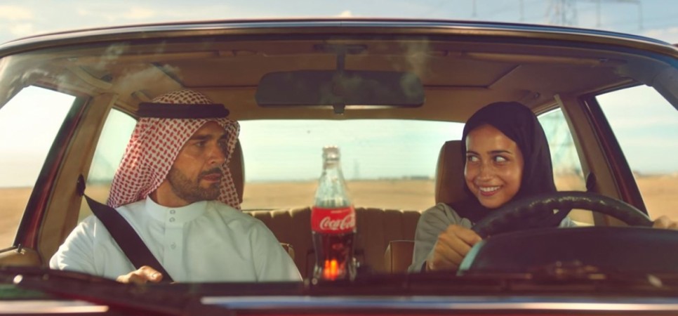 Coca-Cola commercial shows a Saudi father teaching his daughter how to drive. coca cola ad