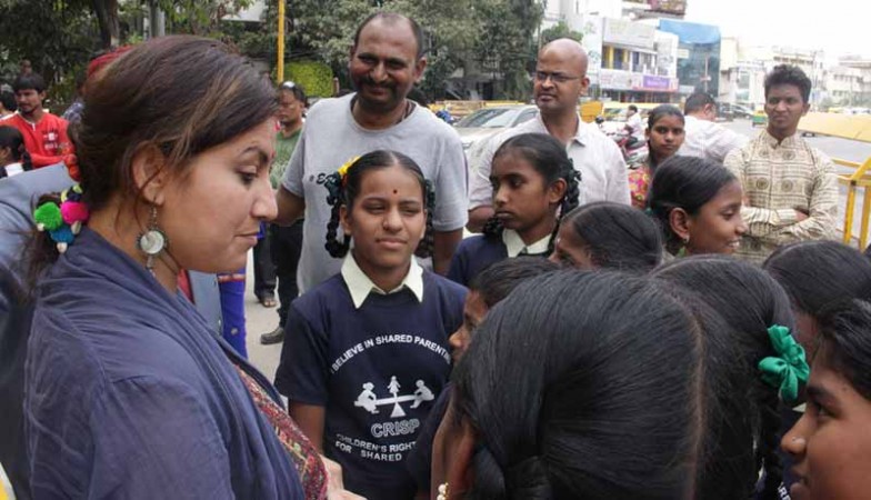 Kannada actor Bhavana talks to children in an awareness campaign over shared parenting, on Tuesday bHAVANA