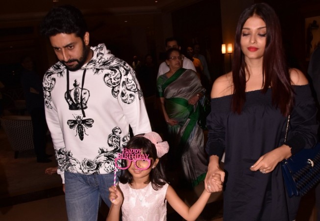 Aaradhya with parents, Abhishek Bachchan and Aishwarya Rai Bachchan Aaradhya with parents, Abhishek Bachchan and Aishwarya Rai Bachchan