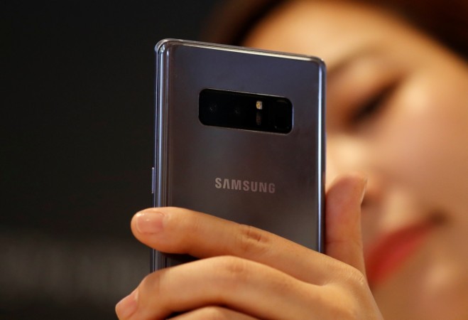 An employee demonstrate a Samsung Electronics' Galaxy Note 8 during its launching ceremony in Seoul, South Korea, September 12, 2017. Samsung