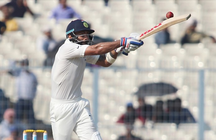 Virat Kohli plays a shot en route to his 18th Test ton at Eden Gardens. Virat Kohli