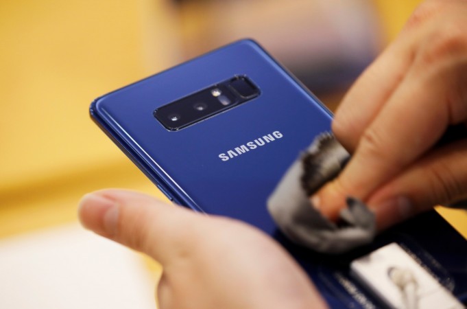 An employee wipes a Samsung Electronics Galaxy Note 8 at its office building in Seoul, South Korea, August 25, 2017. Samsung Galaxy S9 rumours