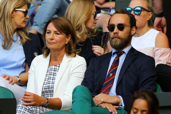 Carole and James Middleton look on from centre court on day eleven of the Wimbledon Lawn Tennis Championships at the All England Lawn Tennis and Croquet Club at Wimbledon at Wimbledon James Middleton