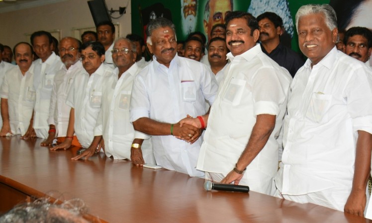 Tamil Nadu Chief Minister Edappadi K. Palaniswami along with the state's former chief minister O. Paneerselvam during the merger of the two factions of AIADMK at the party's headquarters in Chennai on Aug 21, 2017. EPS OPS