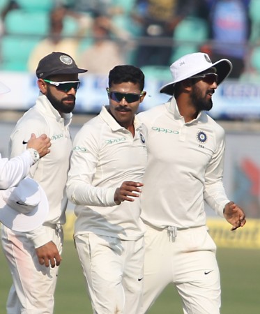 From left: Kohli, Jadeja and KL Rahul celebrate Dickwella's dismissal in Nagpur on Friday (November 24) during the second Test. Virat Kohli