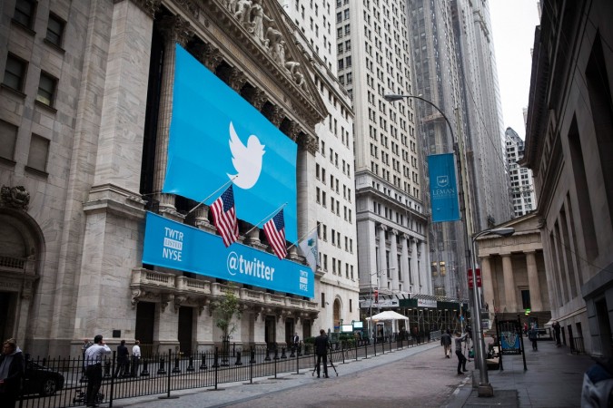 NEW YORK, NY - NOVEMBER 07: The Twitter logo is displayed on a banner outside the New York Stock Exchange (NYSE) on November 7, 2013 in New York City. Twitter goes public on the NYSE today and is expected to open at USD 26 per share, making the company worth an estimated USD 18 billion. Twitter Goes Public On The New York Stock Exchange