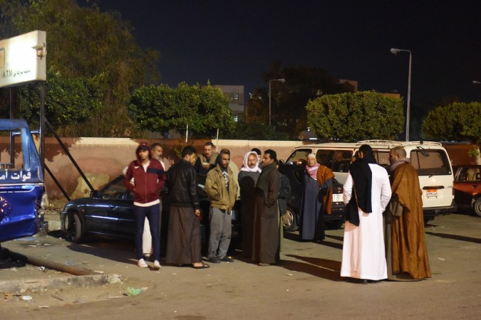 Relatives wait outside a hospital where the injured people receive medical treatment in Ismailia, Egypt on Nov. 24, 2017. The death toll in an attack on Friday on a mosque in Egypt's North Sinai province rose to 235, Egypt's state TV reported. Egypt mosque attack
