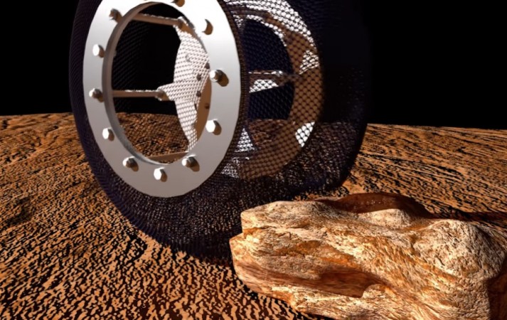 Spring Tire made of nickel titanium, a shape memory alloy, undergoing durability test at NASA's Jet Propulsion Laboratory (JPL). Spring Tire made of nickel titanium, a shape memory alloy, undergoing durability test at NASA's Jet Propulsion Laboratory (JPL).