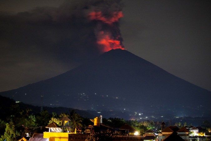 Mount Agung spews volcanic ash into the sky at night on November 27, 2017 Bali volcano