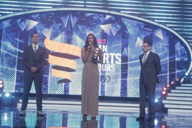 PV Sindhu (centre) speaks after being honoured. PV Sindhu