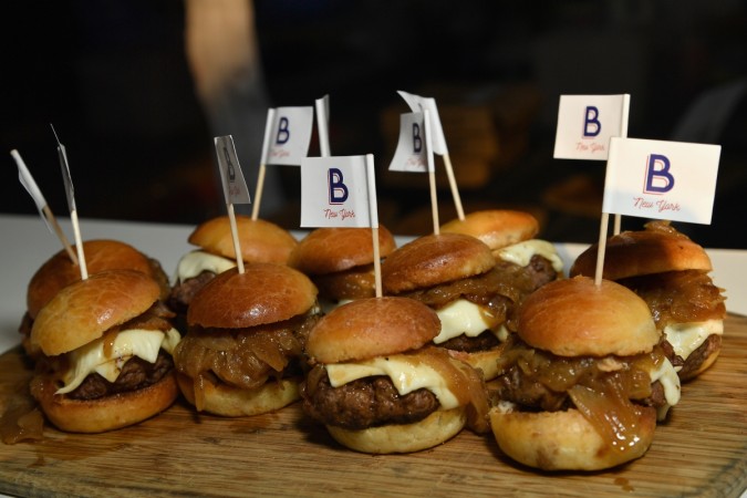 Burgers from Benoit on display at the Food Network & Cooking Channel New York City Wine & Food Festival Presented By Coca-Cola - Blue Moon Burger Bash presented by Pat LaFrieda Meats hosted by Rachael Ray at Pier 92 on October 13, 2017 in New York City. Burgers