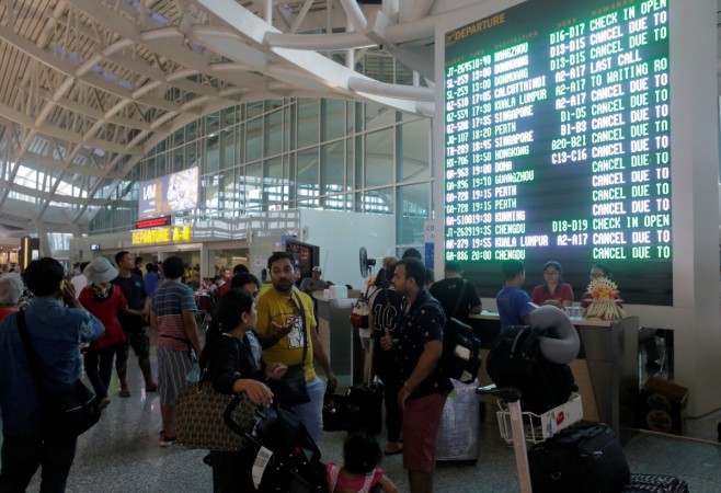 International passengers are seen outside the terminal after the airport on the resort island of Bali reopened following the eruption of Mount Agung volcano at Ngurah Rai International Airport, Kuta, Bali, Bali Airport