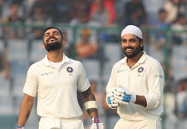 Kohli (left) and Vijay added 283 runs for the third wicket on Day 1 in New Delhi. Murali Vijay