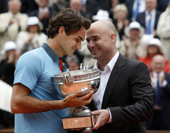 File picture of Roger Federer and Andre Agassi. Andre Agassi, Poger Federer
