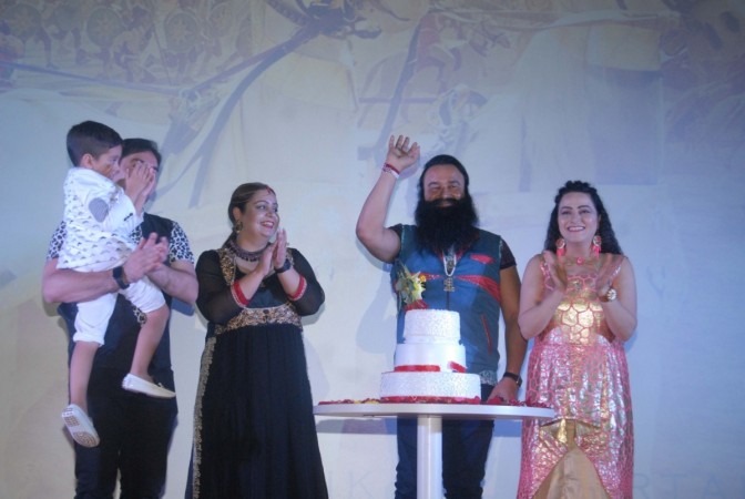 Dera Sacha Sauda chief Gurmeet Ram Rahim (C) and his adopted daughter Honeypreet Insan (right) Ram Honey