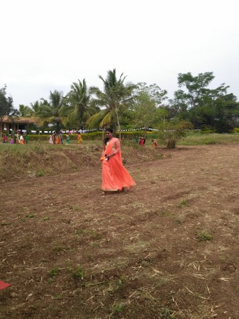 A young Adivasi woman is seen donning an 'Anarkali' dress common in urban areas Tribal life