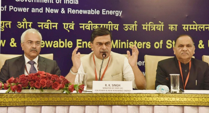 Minister of State (I/C) for Power and New and Renewable Energy Raj Kumar Singh addresses a press conference regarding the Conference of Power and Renewable Energy Ministers of States & UTs in New Delhi on December 7, 2017. Ministry of Power Secretary Ajay Kumar Bhalla is also seen. RK Singh