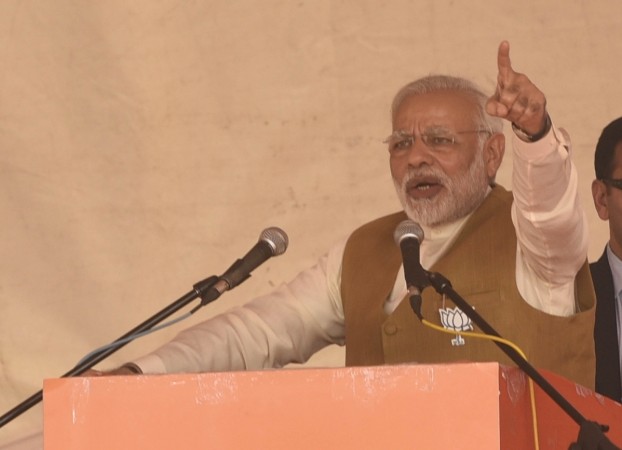 Prime Minister and BJP leader Narendra Modi addresses a party rally ahead of Gujarat Assembly polls in Kalol of Gujarat's Gandhinagar on Dec 8, 2017. Modi in Gujarat1111