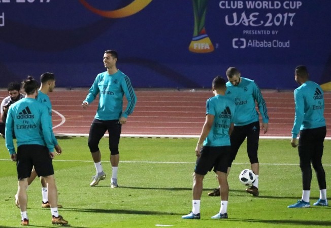 Real Madrid players take part in a training session on the eve of their FIFA Club World Cup semi-final football match at the New York University Abu Dhabi stadium in the Emirati capital on December 12, 2017 real madrid