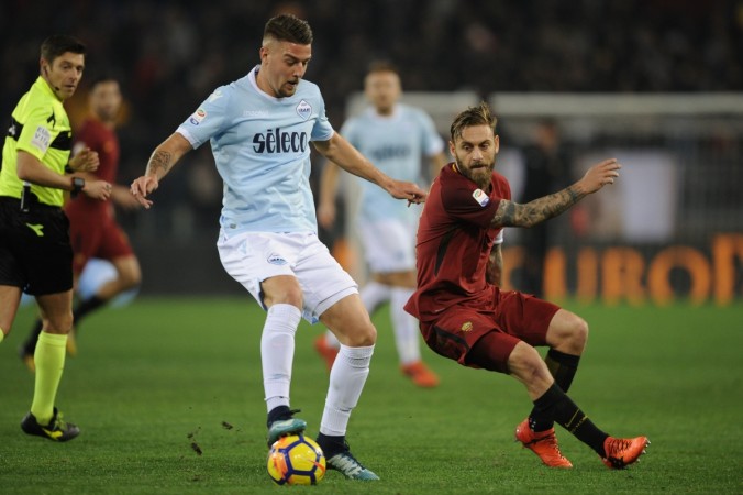 Daniele De Rossi of AS Roma compete for the ball with Sergej Milinkovic Savic of SS Lazio during the Serie A match between AS Roma and SS Lazio at Stadio Olimpico on November 18, 2017 in Rome, Italy Sergej Milinkovic Savic