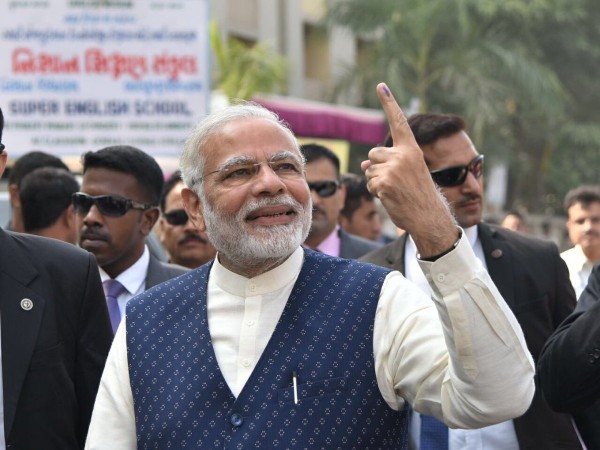 In picture: Prime Minister Narendra Modi shows off the ink on his finger after casting his vote during the second phase of polling of the Gujarat Assembly election on Thursday, December 13, 2017. Prime Minister Narendra Modi