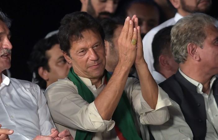 Head of the Pakistan Tehreek-i-Insaf (PTI) party Imran Khan attends a rally in Islamabad on July 30, 2017. Pakistani cricketer-turned-politician Imran Khan