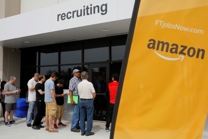 (Picture for Representation only) Job seekers line up to apply during Amazon Job seekers