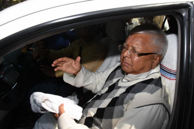 RJD chief Lalu Prasad Yadav arrives to appear before a special CBI court in connection with a multi-crore fodder scam case in Ranchi on Dec 23, 2017. lalu fodder