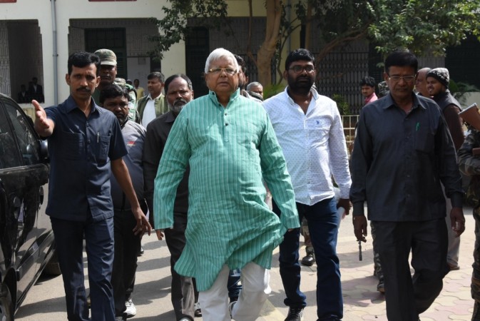 RJD chief Lalu Prasad Yadav arrives to appear before a special CBI Court in connection with a multi-crore fodder scam case in Ranchi on Nov 14, 2017. lalu fodder scam 90s