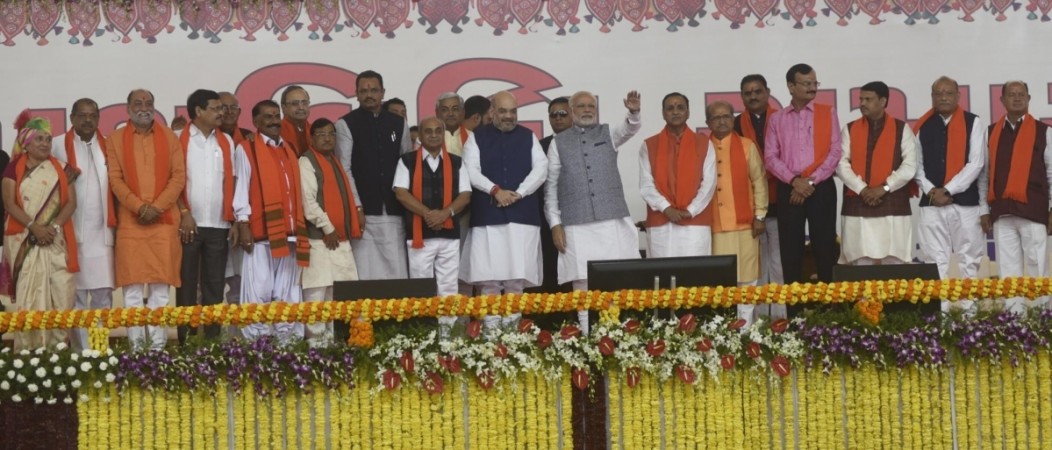 In picture: Prime Minister Narendra Modi and BJP president Amit Shah with Vijay Rupani at his swearing-in ceremony in Gandhinagar on December 26, 2017. Vijay Rupani took oath as chief minister of Gujarat on Tuesday for a second stint after the BJP won the state Assembly elections for the sixth time in a row. Gujarat oath taking