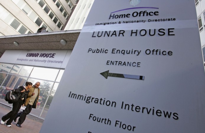 A sign sits outside of Lunar House, the headquarters of Britain's Immigration and Nationality Directorate in Croydon, England. UK immigration