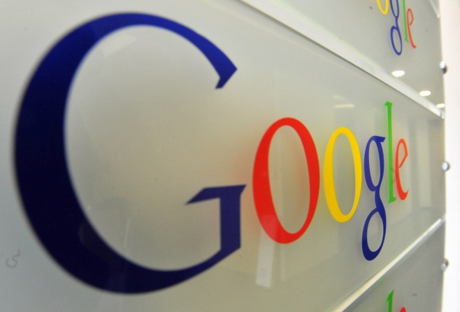 Google logo is seen on a wall at the entrance of the Google offices in Brussels on February 5, 2014. The European Commission accepted the latest proposals by US giant Google to remedy complaints it abuses its dominant position in the Internet search market, opening the way to a settlement.'I believe that the new proposal obtained from Google after long and difficult talks can now address the Commission's concerns,' Almunia BELGIUM-EU-INTERNET-ANTITRUST-BUSINESS-GOOGLE