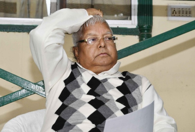 RJD chief Lalu Yadav addresses a press conference in Patna, on Dec 15, 2017. gai bhains paani mein LALU