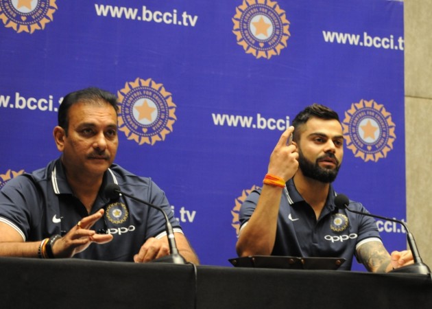 India captain Virat Kohli (right) and coach Ravi Shastri speak to the media in Mumbai on Wednesday (December 27) ahead of the team's departure to South Africa. Virat Kohli Ravi Shastri