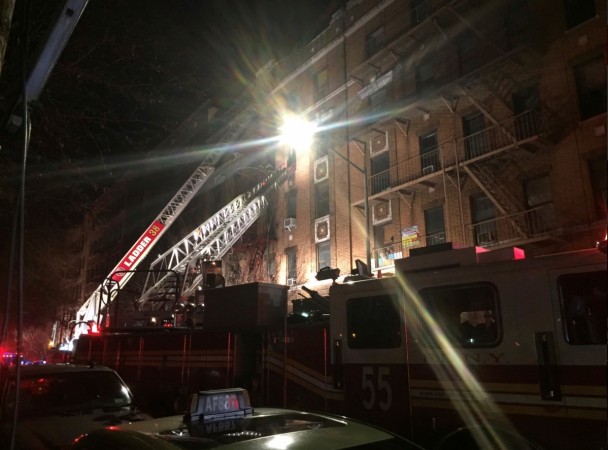 New York Fire Department ladder trucks deploy at a building fire in the Bronx borough of New York City, New York, U.S. December 28, 2017. Bronx fire