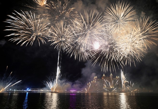 Fireworks explode over the Atlantis hotel in Dubai during the New Year celebrations. Dubai New Year's Eve fireworks
