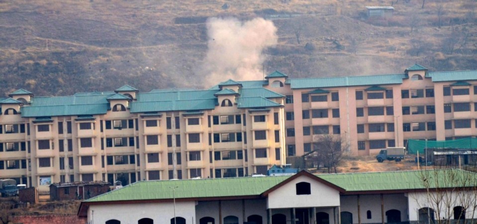 In picture: Smoke raises from the CRPF training centre that was atacked by militants in Lethopora area of Jammu and Kashmir's Pulwama, on December 31, 2017. CRPF camp